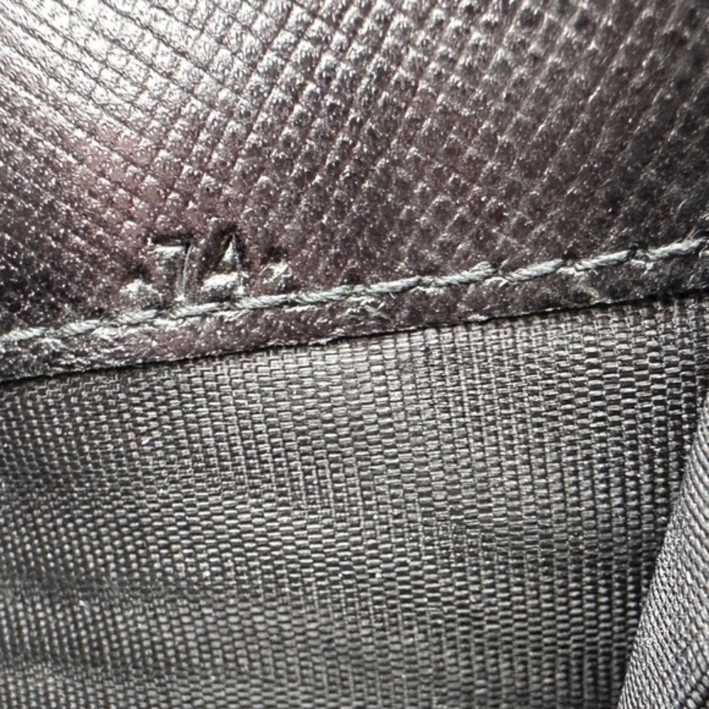 AUTHENTIC Prada wallet in black._14